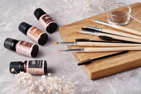 Dobrush, Belarus - October 27, 2019: natural henna powder in bottles with inscription Grafix and eyelash brush, close upのeditorial素材