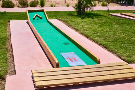 Miniature golf course in hotel. Entertainment for tourists at the hotel