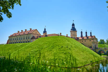 Nesvizh castle in summer day with blue sky. Tourism landmark in Belarus, cultural monument, old fortressのeditorial素材