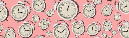 Vintage alarm clock pattern on pink background, long bannerの写真素材