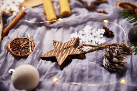 Christmas decoration, top view. Background with wooden christmas decorations on white background, flat lay styleの写真素材