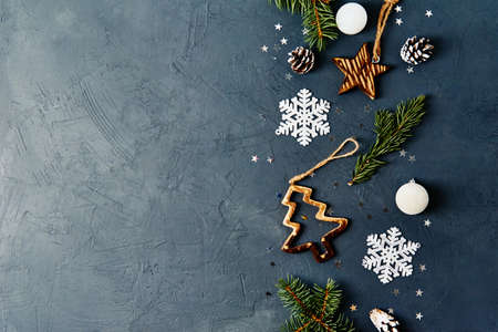Christmas or New Year background with copy space. Christmas decorations on a dark background, top viewの写真素材