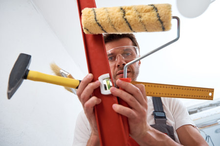Builder man with a construction tools. Repair conceptの写真素材