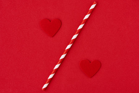 Valentines day. Hearts on the red background, creative conceptの写真素材