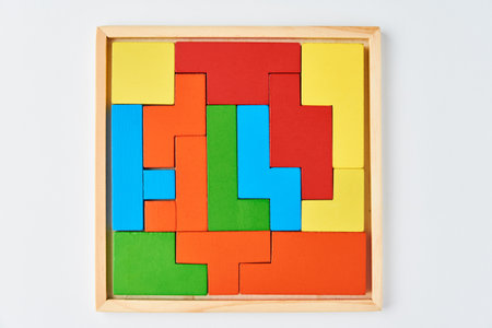 Different wooden blocks on a white background. Concept of logical thinking and education