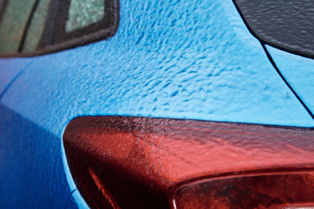 Car covered in freezing rain. Extreme winter weather for a drivingの写真素材