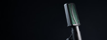 Studio microphone on black background, close upの写真素材
