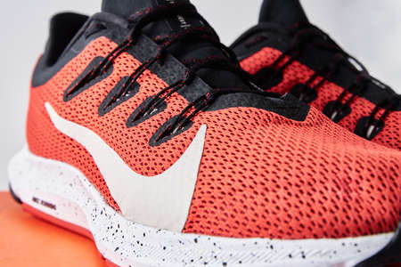 Nike running shoes, close up. Red sneakers for run. Dobrush, Belarus - 18.01.2021のeditorial素材