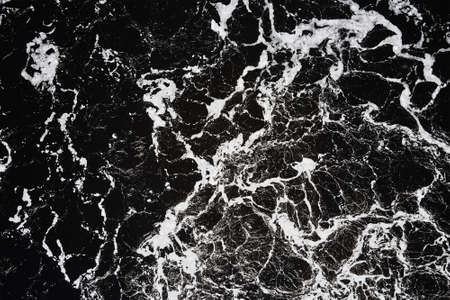 Waves of water in the river with whirpool, aerial view. Water background. Abstract pattern of water...