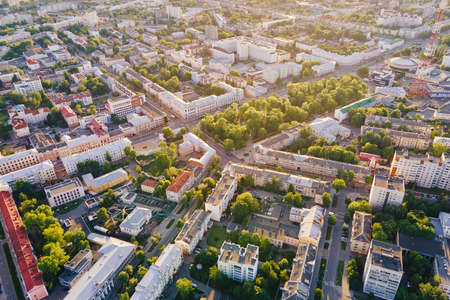 Cityscape of Gomel, Belarus. Aerial view of town architecture. City streets at sunset, bird eye view
