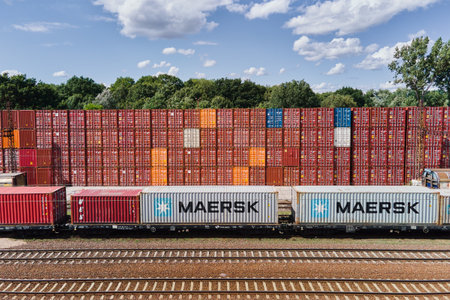 Containers on the railway platform. Business and logistic concept, cargo transit. Katy Wroclawskie, Poland - August 8, 2021のeditorial素材