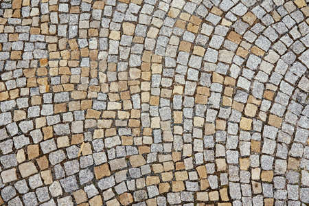 Old pavement stone texture. Abstract background with bricks