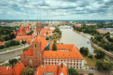 Panorama of Wroclaw city with colorful roofs. Street of Wroclaw, aerial view. Wroclaw, Poland - August 18, 2021のeditorial素材