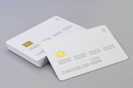 Stack of credit cards on gray background. Bank cards mock up, 3d illustration. Online shopping and digital money conceptの写真素材