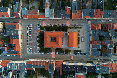 Aerial view of old european city. Central square of small town cityscape with building roofs, top...