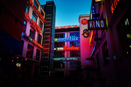 Ruska street in Wroclaw city with glowing neon signs on buildings at night.Wroclaw, Poland - July 29, 2021のeditorial素材