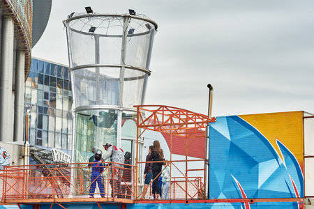Man prepare to fly in aerodynamic wind tunnel. Active leisure time. Saint Petersburg, Russia - August 10, 2019のeditorial素材