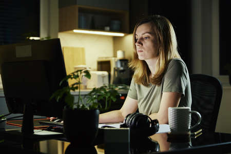 Tired woman works from home use computer at night, overwork burnout, freelancer works remote at home...