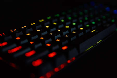 Gaming keyboard, close up. Mechanical rgb keyboard for computer games on dark backgoundの写真素材