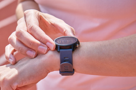 Woman use fitness watch before cardio exercises, Checking results on smart watch after training,...