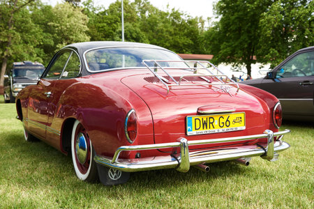 Rear view of red vintage VW Volkswagen Karmann Ghia on car show. Retro german sport car. Katy Wroclawskie, Poland - May 28, 2022のeditorial素材