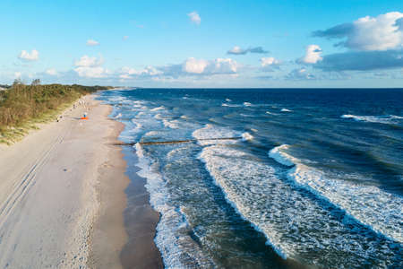 Drone aerial view of sea seashore landscape with sand beach without people, Baltic sea coastline in Polandの写真素材