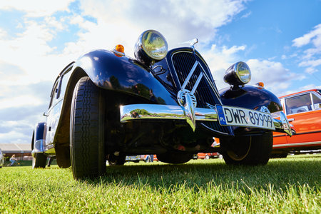 Front view of retro car with headlights, close up. Classic american car. Katy Wroclawskie, Poland -...