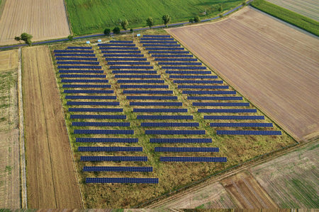 Solar panels battery in field against, aerial view. Photovoltaic modules for renewable energy....