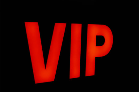 Inscription VIP, red letters on dark backgroundの写真素材