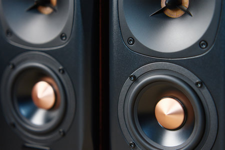 Two sound speakers on the floor. Set for listening music. Audio equipment