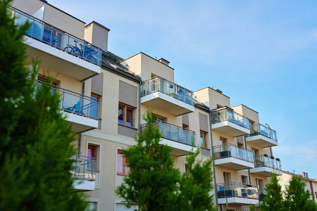 Residential building facade with balconies and windows. Modern city architecture. Apartment building...