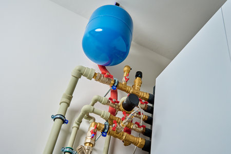 Closed heating system featuring expansion tank, pipes, and shut-off valves, ensuring efficient...