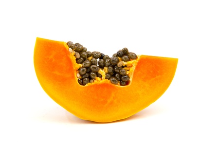 sliced papaya isolated on a white backgroundの写真素材