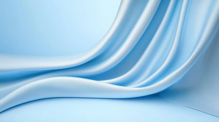 Light blue fabric background with subtle creases and soft textures, creating a luxurious and elegant visual element.の素材