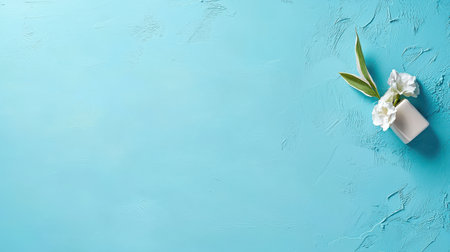 An industrial-style light blue background with a rough, distressed finish, perfect for modern branding or product photography.の素材