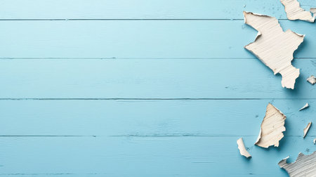 A distressed light blue background with peeling paint effects, adding a rustic charm ideal for creative projects, posters, or invitations.の素材