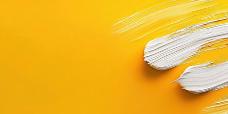 Distressed yellow background with rough brush strokes and grunge elements for a bold look.の素材