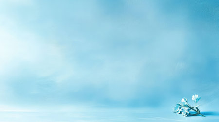 Solid light blue wallpaper with soft shading, designed for use as a modern desktop or website background.の素材