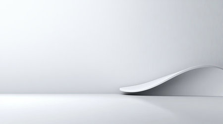 A minimalist grey background with a subtle gradient, transitioning from light grey to a slightly darker tone.の素材