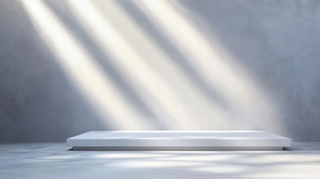 A classic grey studio backdrop, evenly lit, providing a neutral setting for portraits, headshots, or product displays.の素材