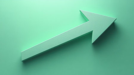 A shiny arrow pointing upwards with a soft shadow on a lime green backgroundの素材