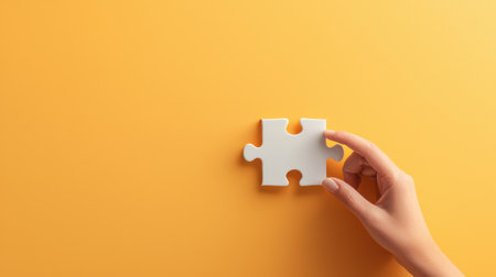 A puzzle with one missing piece held by a hand, symbolizing the complexities of mental health and the search for solutions. Simple, bright background.の素材