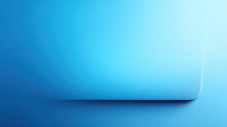 A calming abstract blue gradient background featuring a soft light effect and smooth curved edge, ideal for various creative digital design projects.の素材