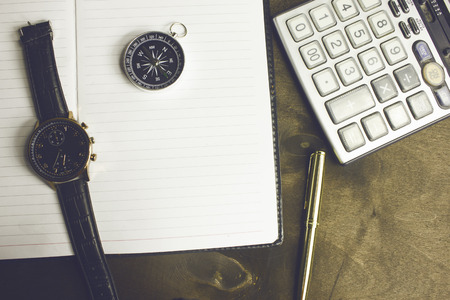 Compass pen and calculator there are other items in your desktopの写真素材