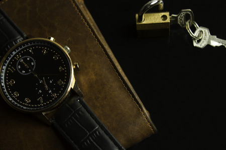 Wallet wrist watches Kei black backgroundの写真素材
