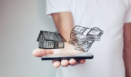 Mortgage concepts. House and moneyの写真素材