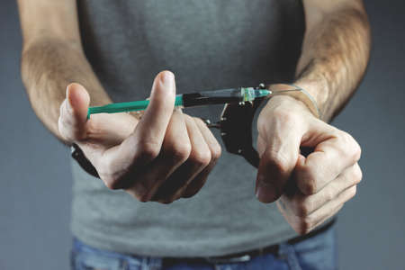 young man hand compassの写真素材