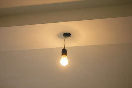 Light bulb from the ceiling.の写真素材