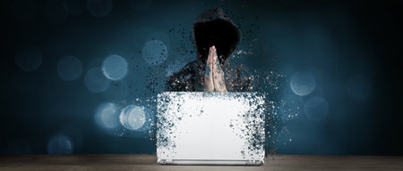 Hacker with laptop. Computer crime.の写真素材