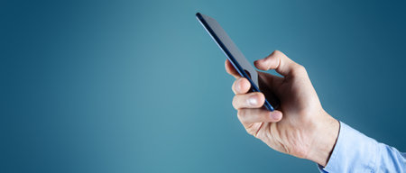 Man using his mobile phoneの写真素材
